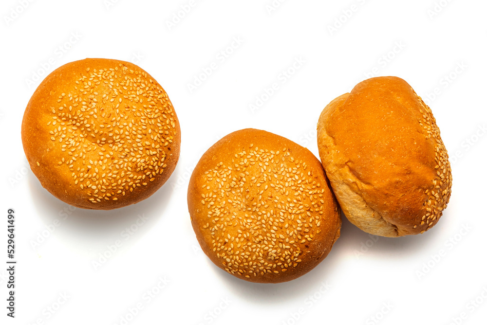 Homemade freshly baked burger bun on isolated background. Top view Homemade freshly baked burger bun on isolated background. Top view