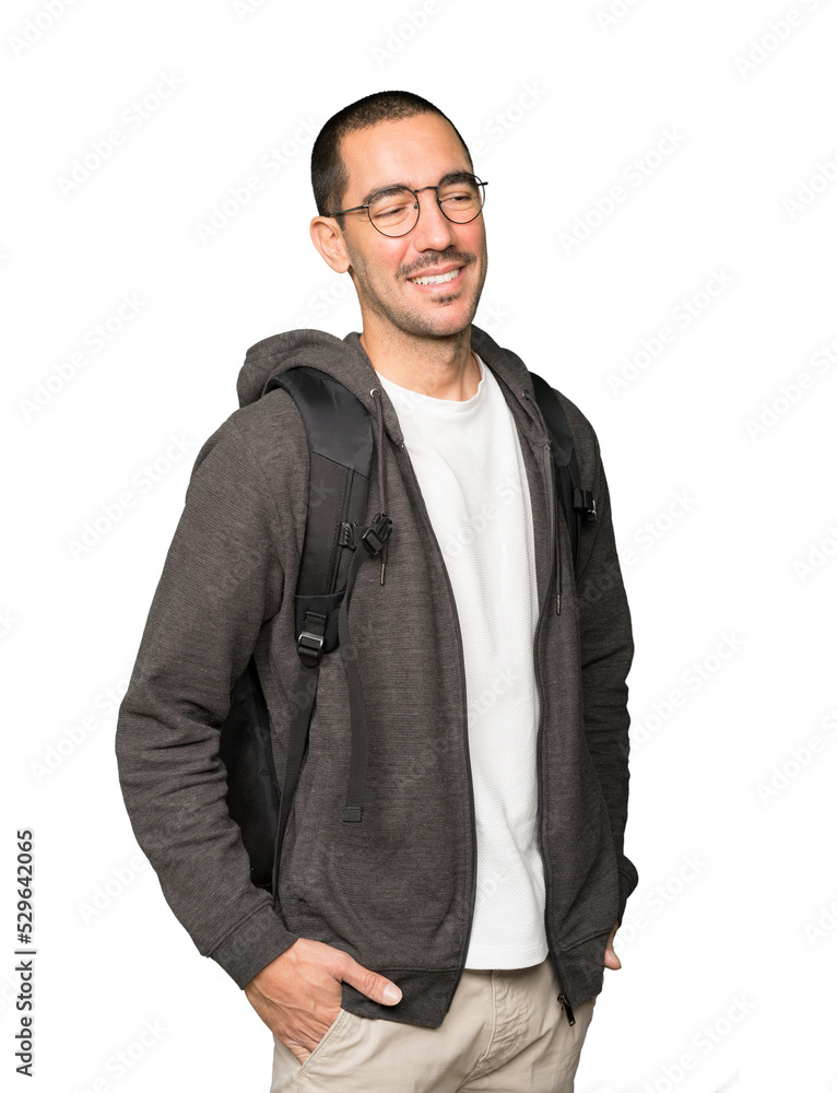 Fototapeta premium Happy student posing against background