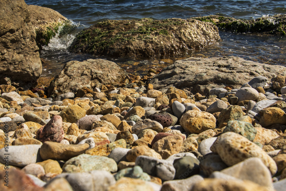 a stone shore by the sea