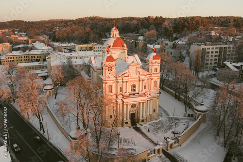 Aerial view of the Church of St. Peter and St. Paul, located in Antakalnis district in Vilnius. Beautiful winter day in the capital of Lithuania.