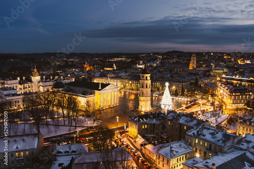 Beautiful aerial view of decorated and illuminated Christmas tree on the Cathedral Square at night in Vilnius  Lithuania.