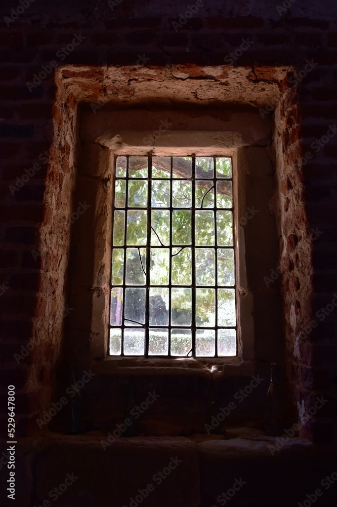 Interior view through the window in the medieval house, England, UK Interior view through the window in the medieval house, England, UK