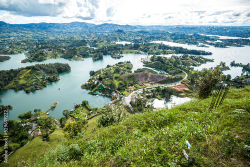 Guatap   incredible breathtaking view on a beautiful nature of northwest Colombia  just a short travel for tourist from Medell  n. View from famous Pe    n de Guatap   in Antioquia Colombia. Medell  n