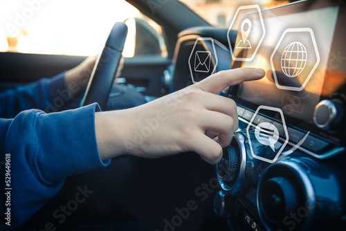 Drive using smartphone. Automotive technology concept. Infotainment, navigation communication device photo