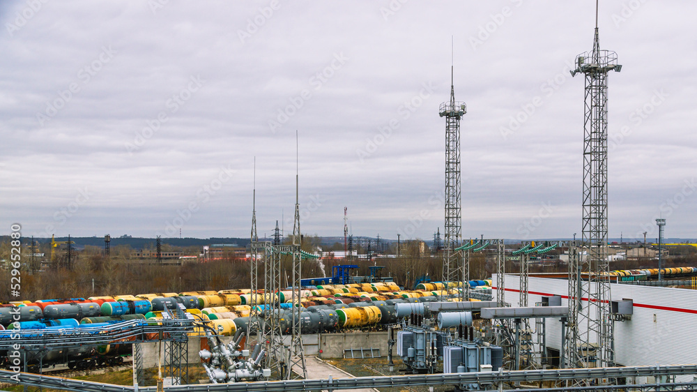 Electrical substation. Railway tanks..An electrical installation designed for receiving, converting and distributing electrical energy. An electrical transformer for converting electrical energy. Electrical substation. Railway tanks..An electrical installation designed for receiving, converting and distributing electrical energy. An electrical transformer for converting electrical energy.