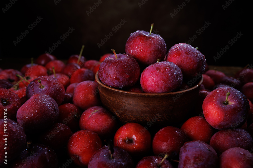 Clay plate with red apples. Background from ripe red apples. Clay plate with red apples. Background from ripe red apples.
