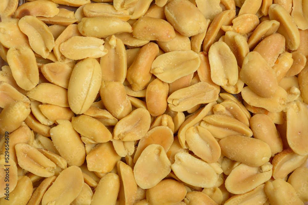 Salted Peanuts on natural light. Top view close up. Salted Peanuts on natural light. Top view close up.