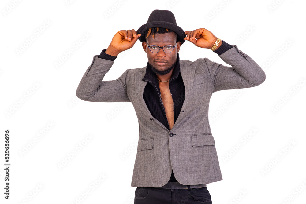 young businessman wearing a black hat. young businessman wearing a black hat.