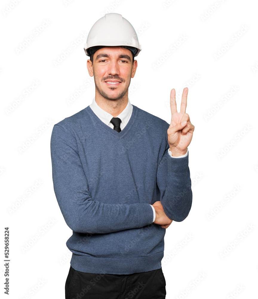 Young architect making a gesture of number two Young architect making a gesture of number two