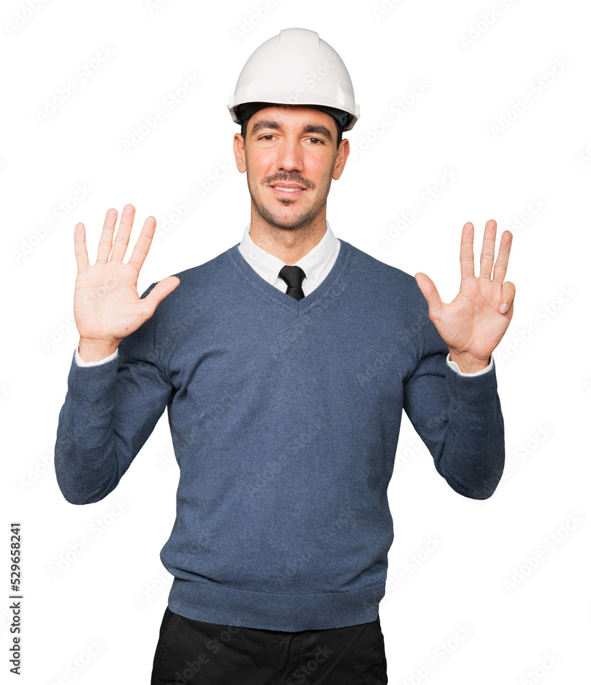 Young architect making a gesture of number nine