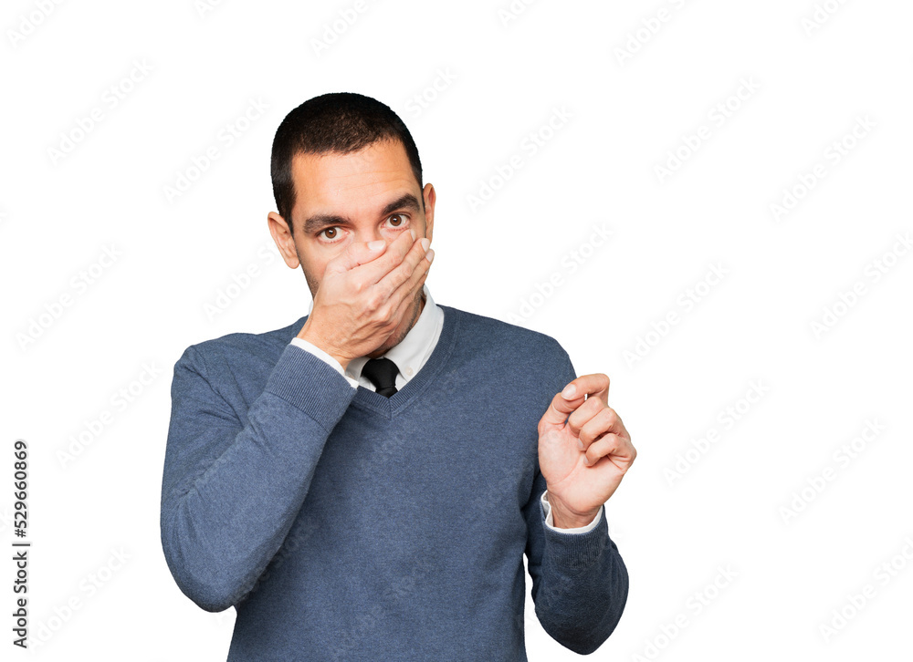 Concerned young man with a gesture of disgust Concerned young man with a gesture of disgust