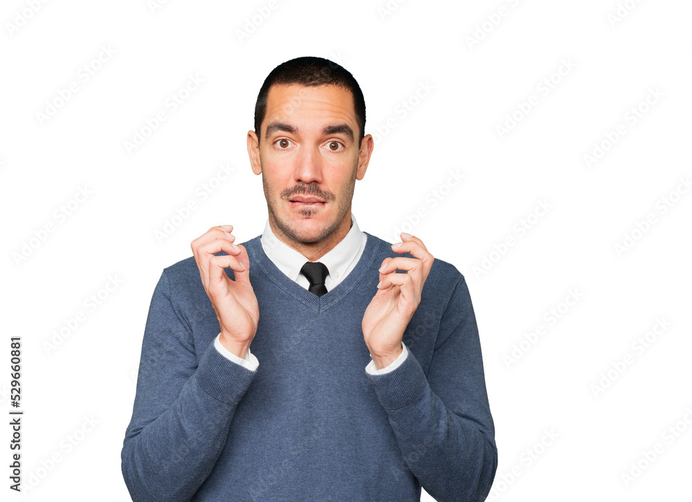 Astonished young man with a gesture of shock Astonished young man with a gesture of shock