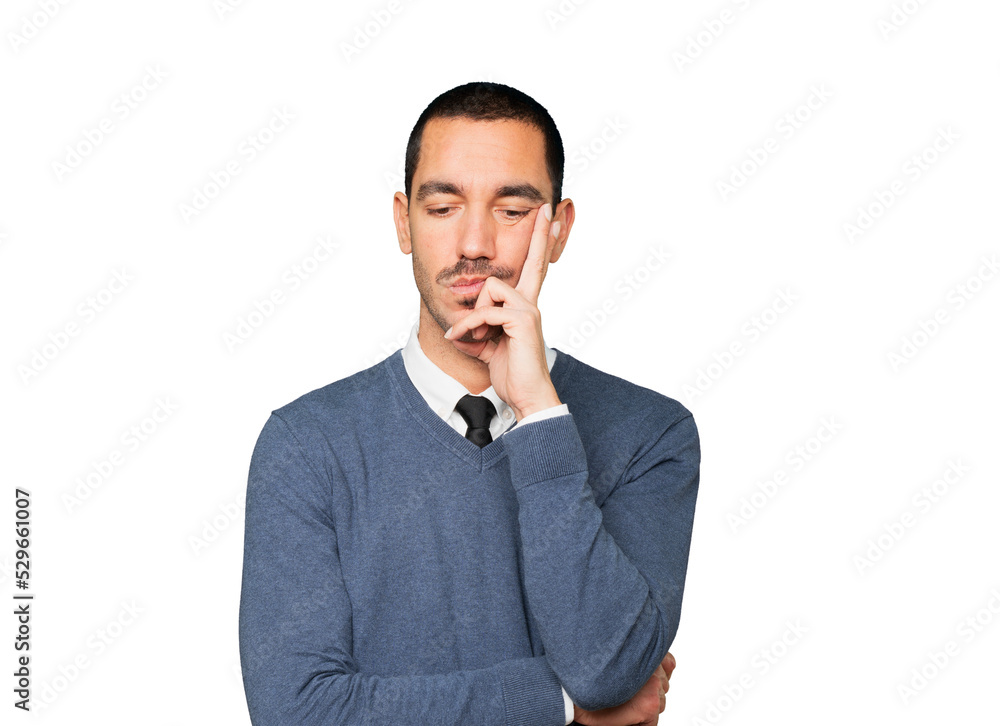 Serious young man with a gesture of disappointment Serious young man with a gesture of disappointment