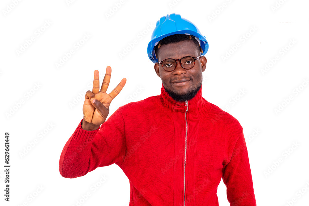 young man engineer showing three fingers smiling.