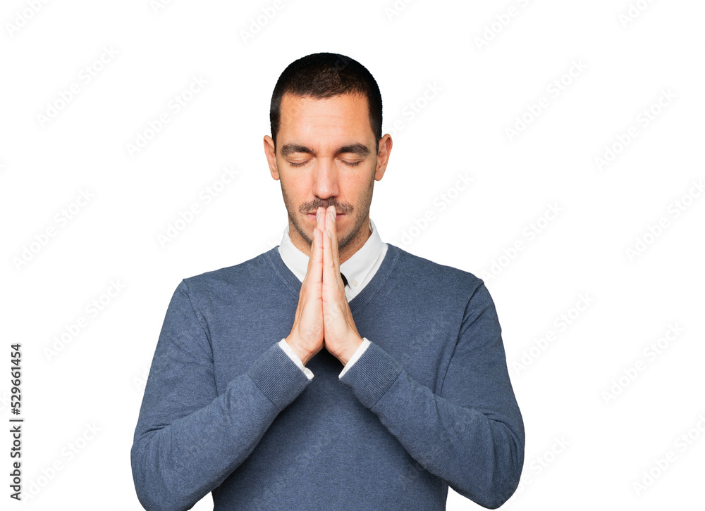Happy young man praying gesture Happy young man praying gesture