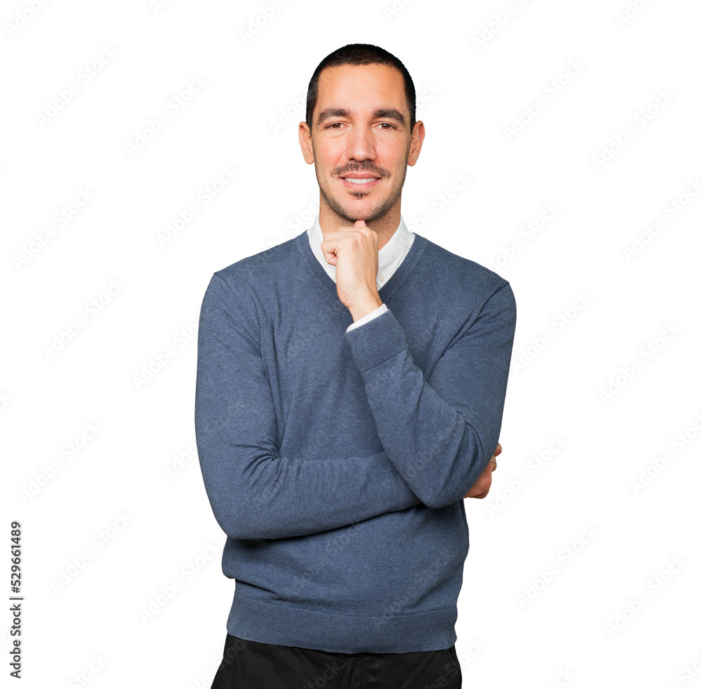 Satisfied young man with crossed arms gesture Satisfied young man with crossed arms gesture