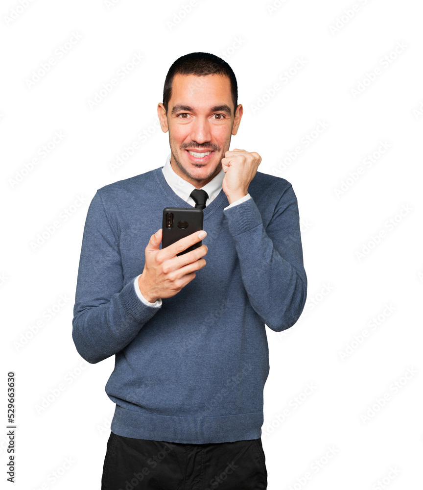 Surprised young man using his mobile phone Surprised young man using his mobile phone