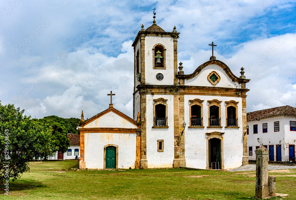 Old historic church surrounded by colonial houses in the famous and bucolic city of Paraty on the coast of Rio de Janeiro