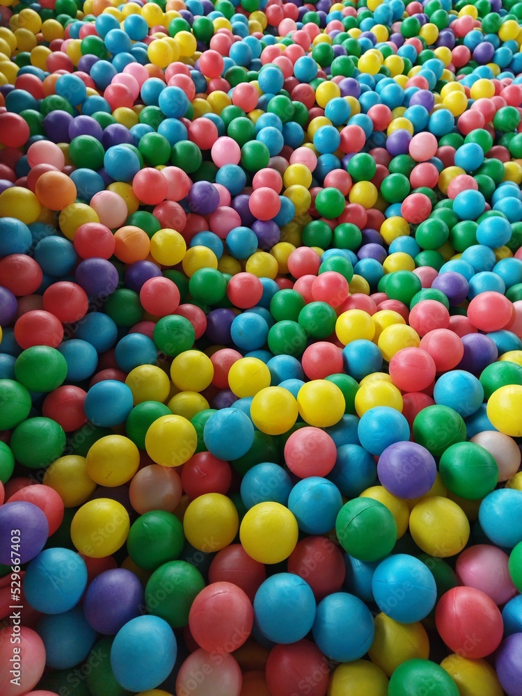 hundreds of colorful little balls, a collection of balls for ball bathing hundreds of colorful little balls, a collection of balls for ball bathing