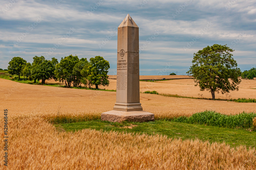 Obraz premium The 14th Connecticut Monument amont the Wheat, Antietam National Battlefield, Maryland USA, Sharpsburg, Maryland