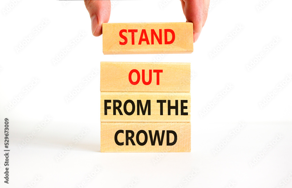 Stand out from the crowd symbol. Concept words Stand out from the crowd