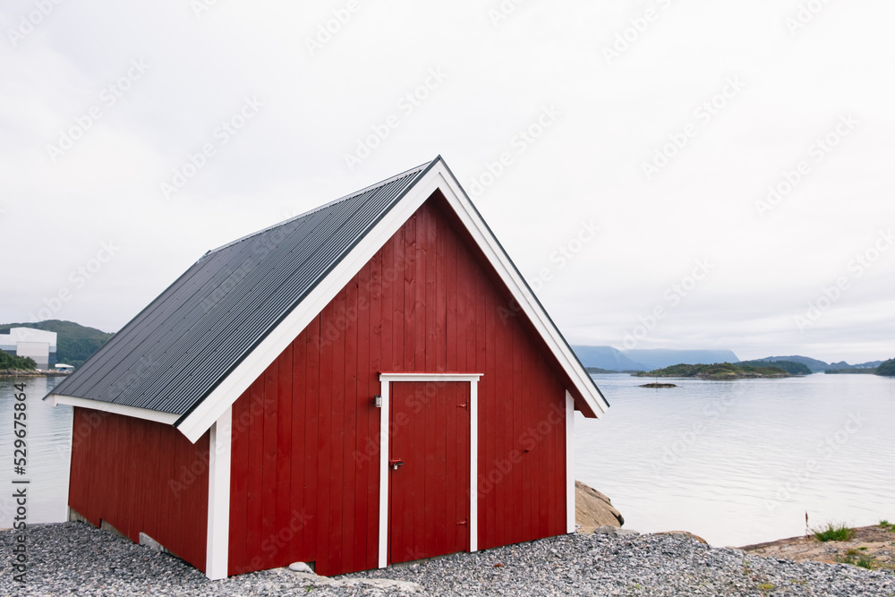 red barn on the beach