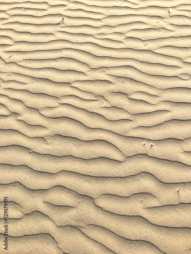 Onde de sable sur la plage
