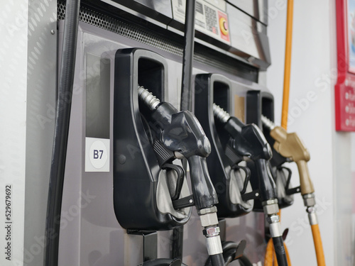 Diesel formula B7 mixed with palm oil, black nozzle. gas pumps row closeup. gasoline pump and gasoline filling diesel for cars. Gasoline and diesel distributor at the gas station.