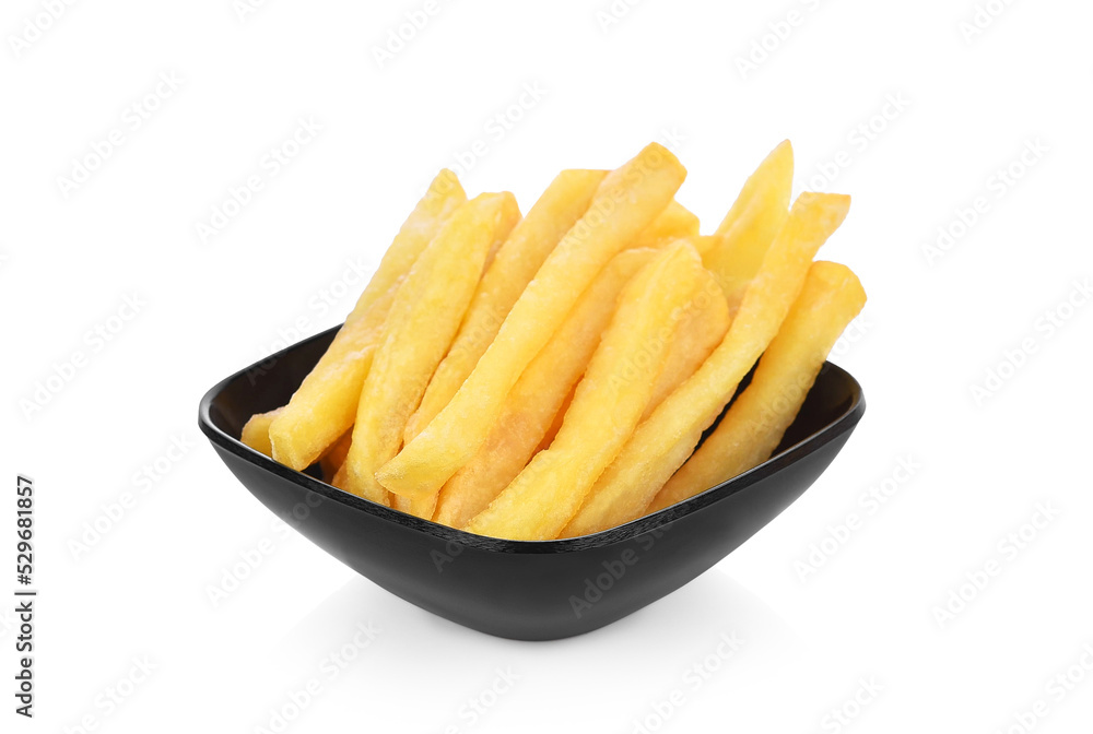 French fries in a black bowl isolated on white background. French fries in a black bowl isolated on white background.