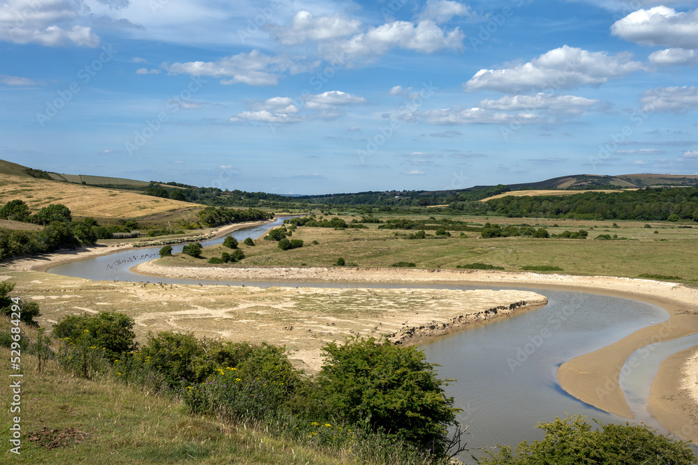 View of the Cuckmere river in summer 2022 on a sunny afternoon, South Downs national park, East Sussex, England