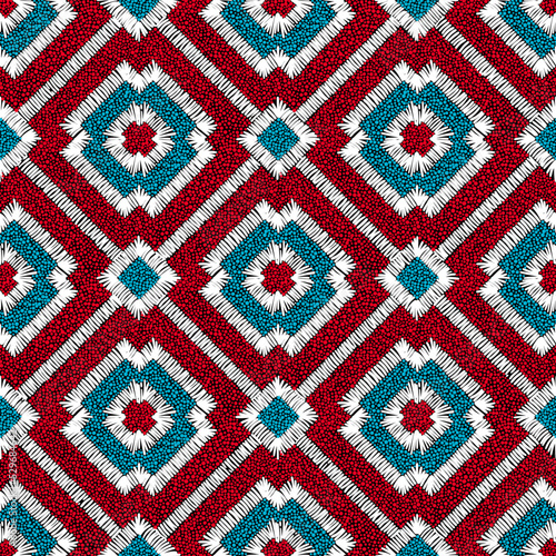 Embroidered seamless geometric pattern. Bohemian ornament for home textiles, pillows, blankets. Ethnic and tribal motifs. Vector illustration.