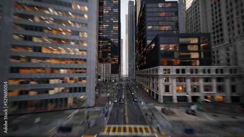 Camera is flying above the bridge between modern skyscrapers showing beautiful panorama of a 3d city. 3d animation
