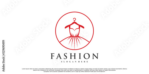 Fashion logo design with dress fashion Premium Vector