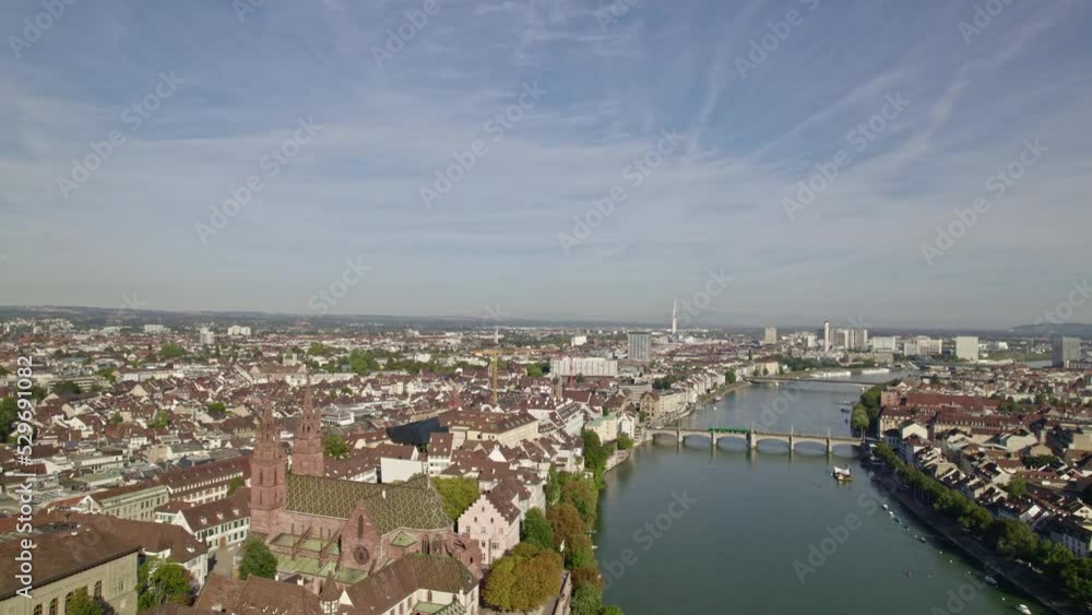 Pan view of City of Basel with Rhine River at Swiss City of Basel on a sunny summer day. Movie shot August 24th, 2022, Basel, Switzerland. Pan view of City of Basel with Rhine River at Swiss City of Basel on a sunny summer day. Movie shot August 24th, 2022, Basel, Switzerland.