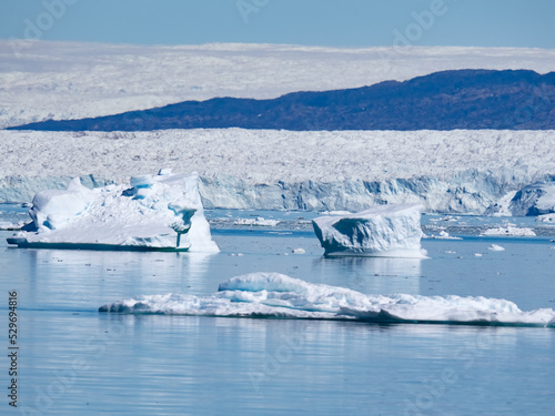 The stunning Eqi Glacier (Eqip Sermia), a rapidly retreating outlet glacier, north of the disko Bay in Western Greenland photo