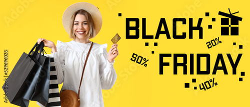 Happy woman with shopping b...