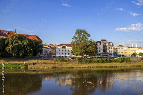 Clear weather in a quiet town. River Uzh is in the foreground. Trip to Uzhgorod