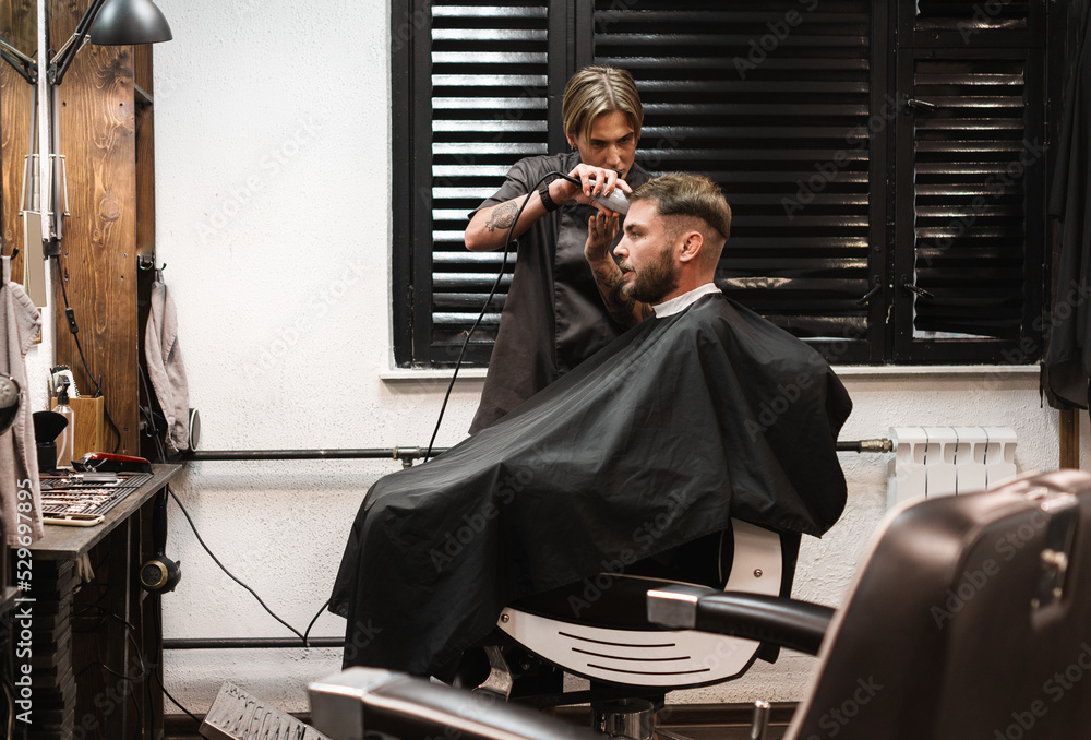 Adult bearded man in the hairdressing salon. Adult bearded man in the hairdressing salon.