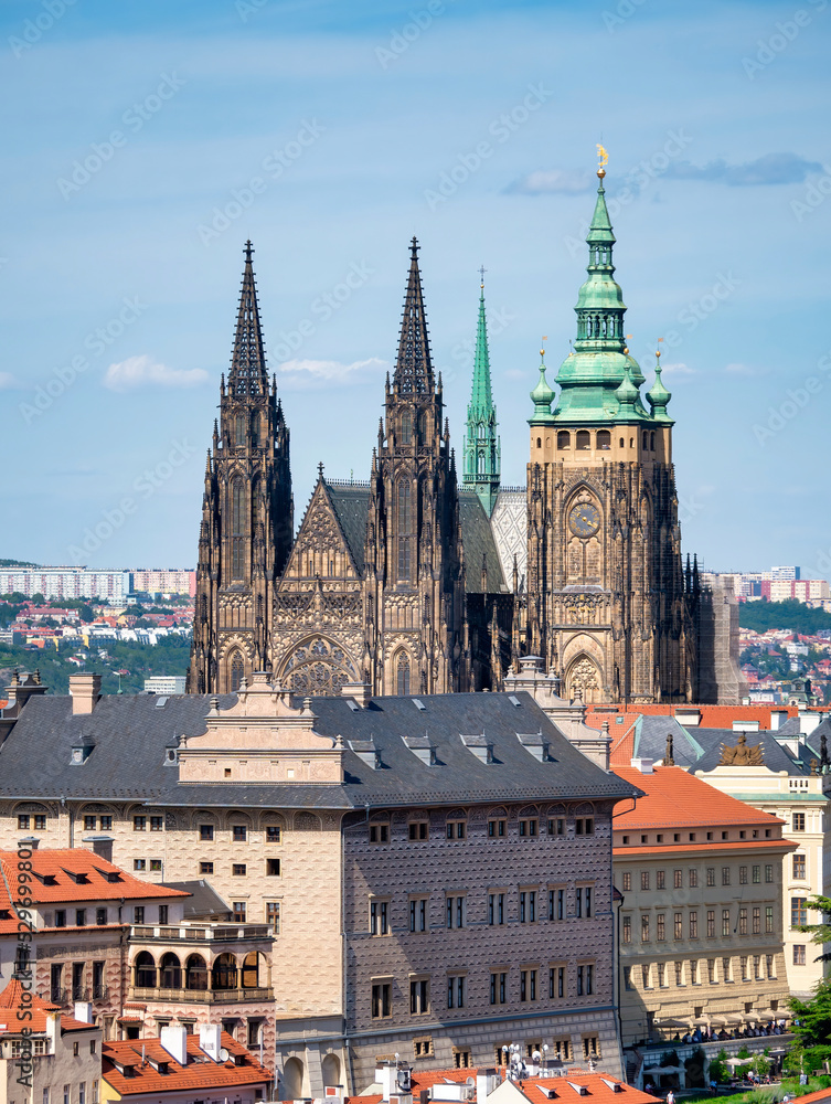 Prague, Czech Republic - June 2022: Beautiful view with the gothic towers of St. Vitus Cathedral located in Prague Castle. close up detail.