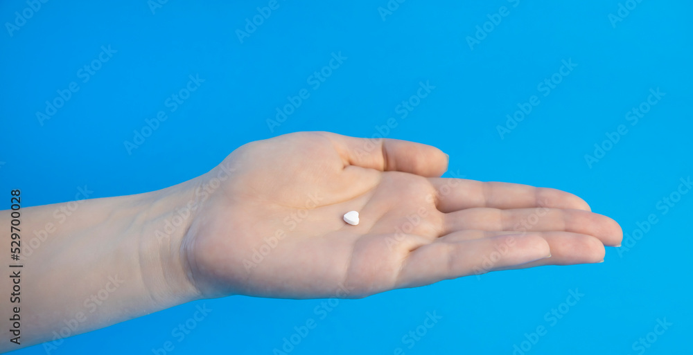 A pill against cardiovascular diseases in the palm of your hand.