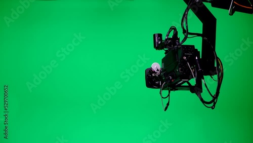 The studio lights turn on and the studio is ready for filming. Professional Crew on Big Budget Filmmaking. On Film Studio Set Shooting Historical Movie or TV show Green Screen Scene.