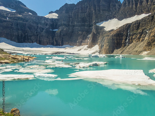 Picturesque view of the turquoise color lake at the base of Grinnel Glacier in Glacier National Park, Montana photo