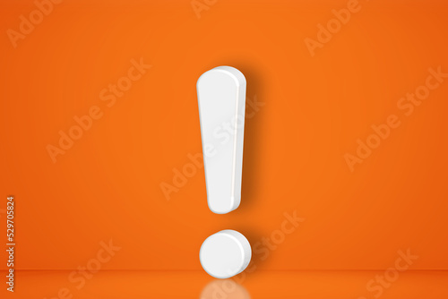 Exclamation mark 3D design in front of a orange color wall background