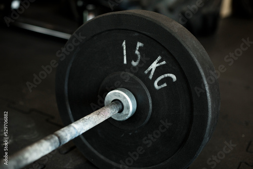 male athlete and athlete prepares barbell for exercises, barbell 15 kg, bodybuilding and competitions, athletes, athletes