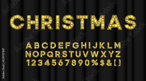 Marquee Christmas alphabet for Vegas showtime. Bulb text effect gold font