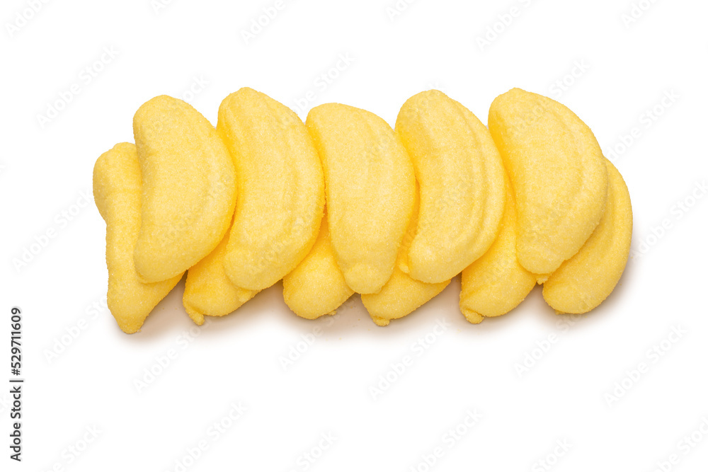 Banana marshmallow candy isolated on a white background. Banana marshmallow candy isolated on a white background.