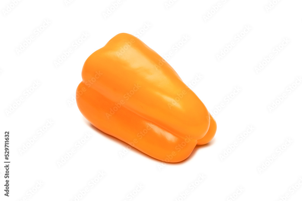 Orange bell pepper isolated on white background. Top view. Copy space. Orange bell pepper isolated on white background. Top view. Copy space.