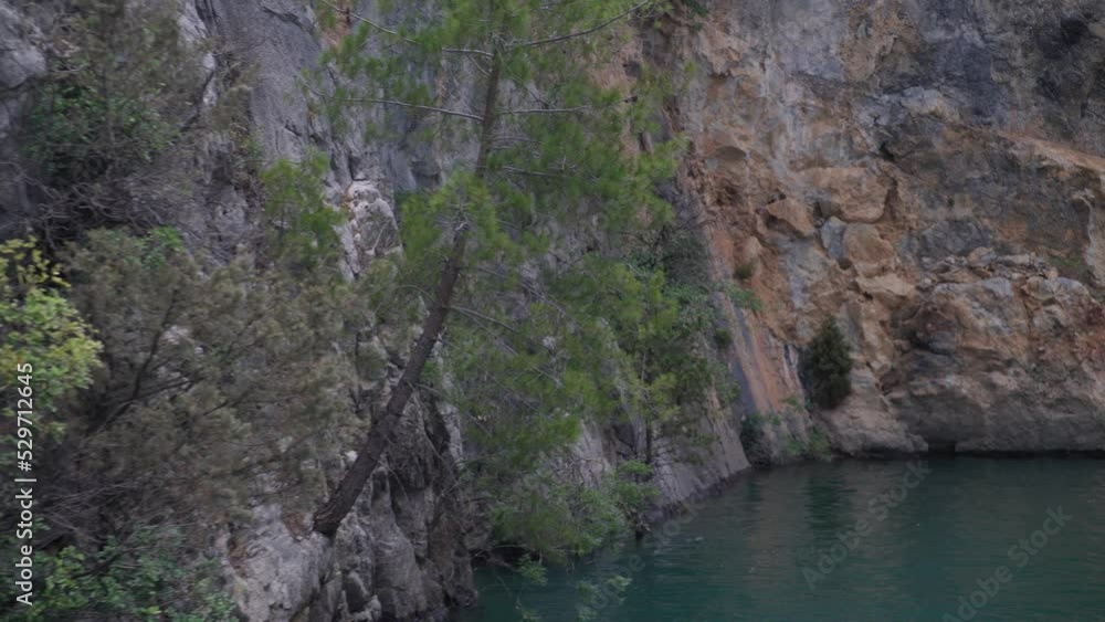 Wild river riverbed beautiful stream of pure clear water flow in mountain. Canyon in an idyllic and wilderness Nature. Wild river riverbed beautiful stream of pure clear water flow in mountain. Canyon in an idyllic and wilderness Nature.