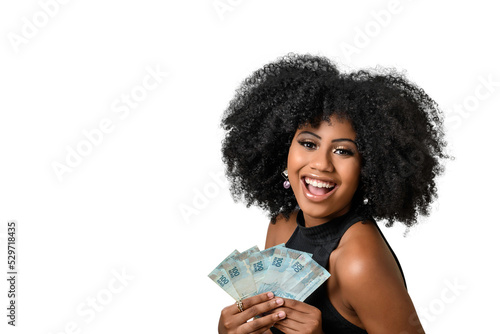  woman smiling holding brazilian money bills, positively surprised, space for text, person, advertising concept 