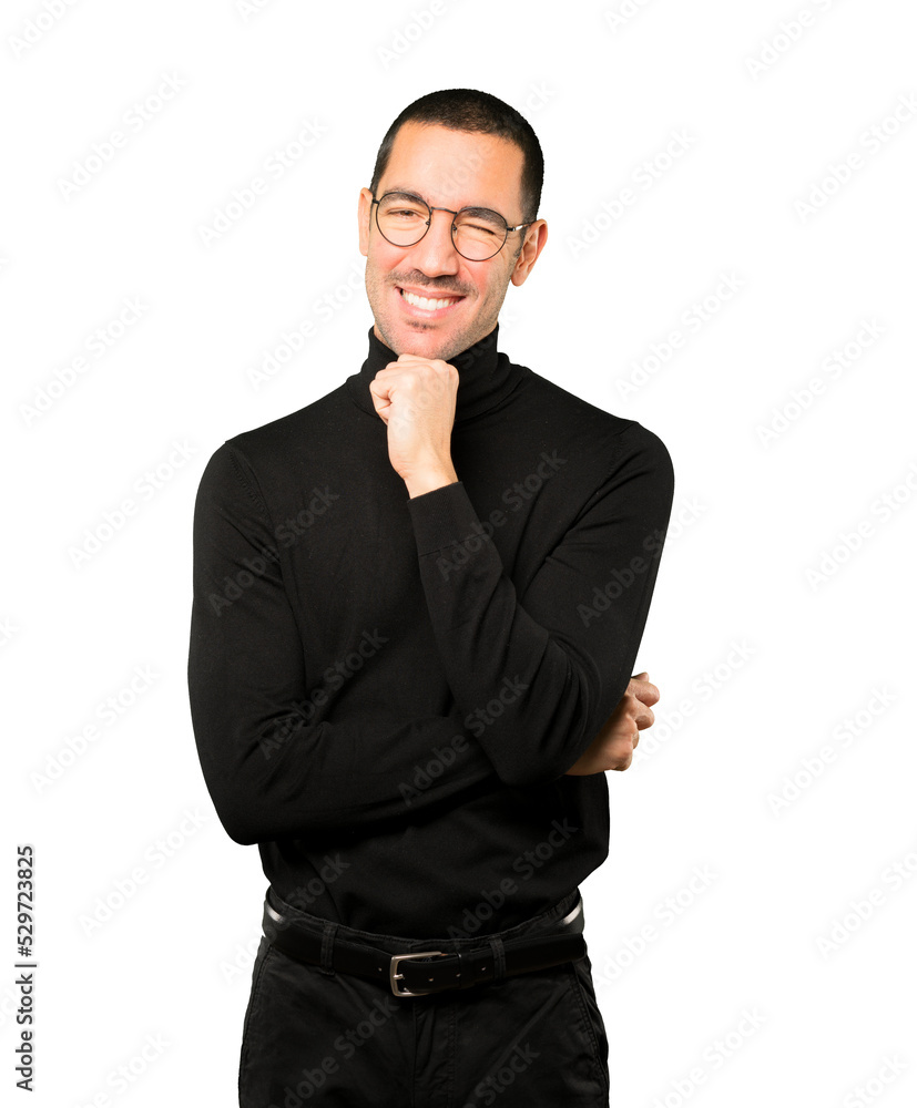 Friendly young man winking an eye Friendly young man winking an eye